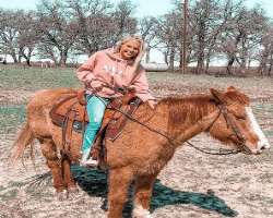 She is also trained in horseback riding.